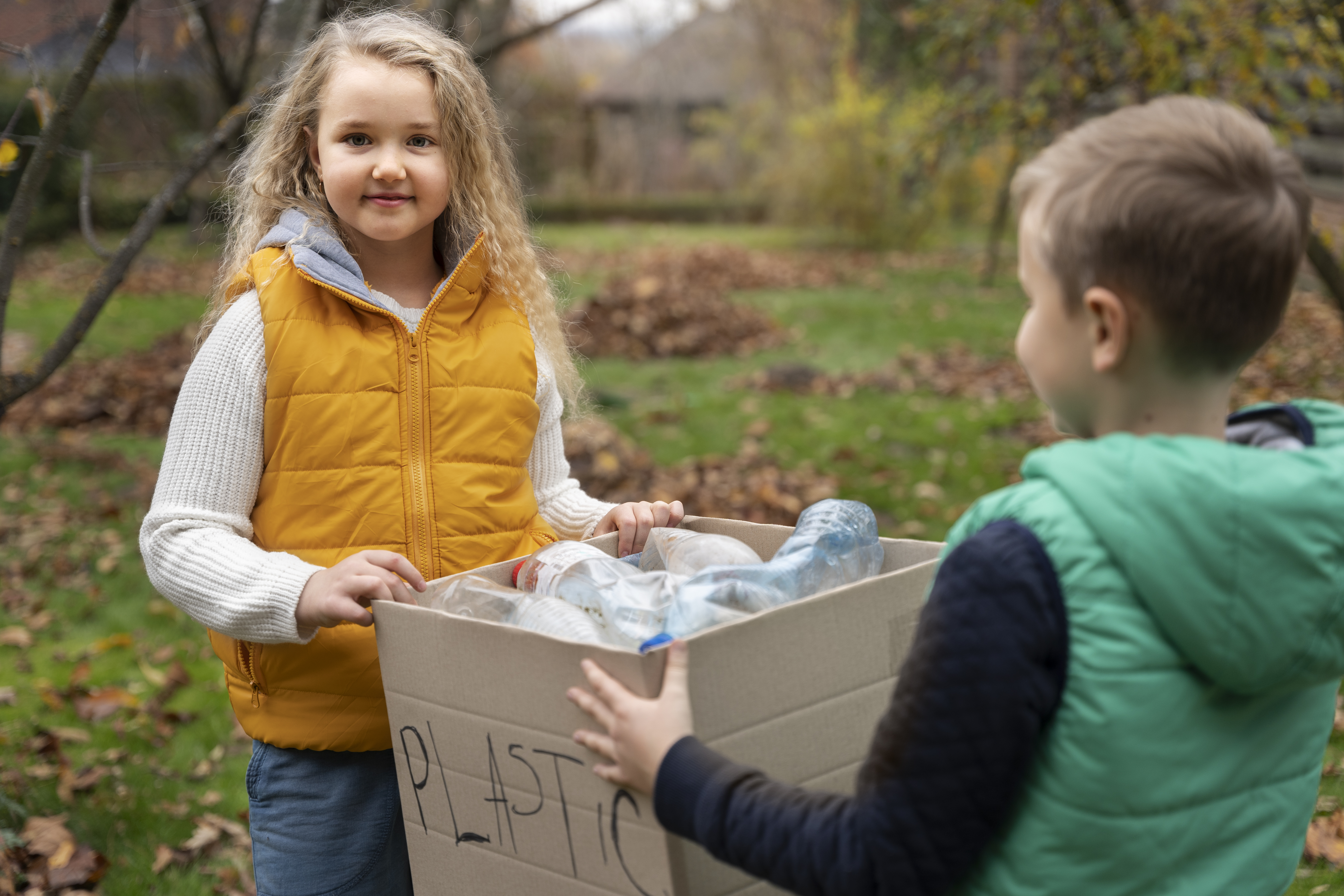 Children working together on a community sustainability project
